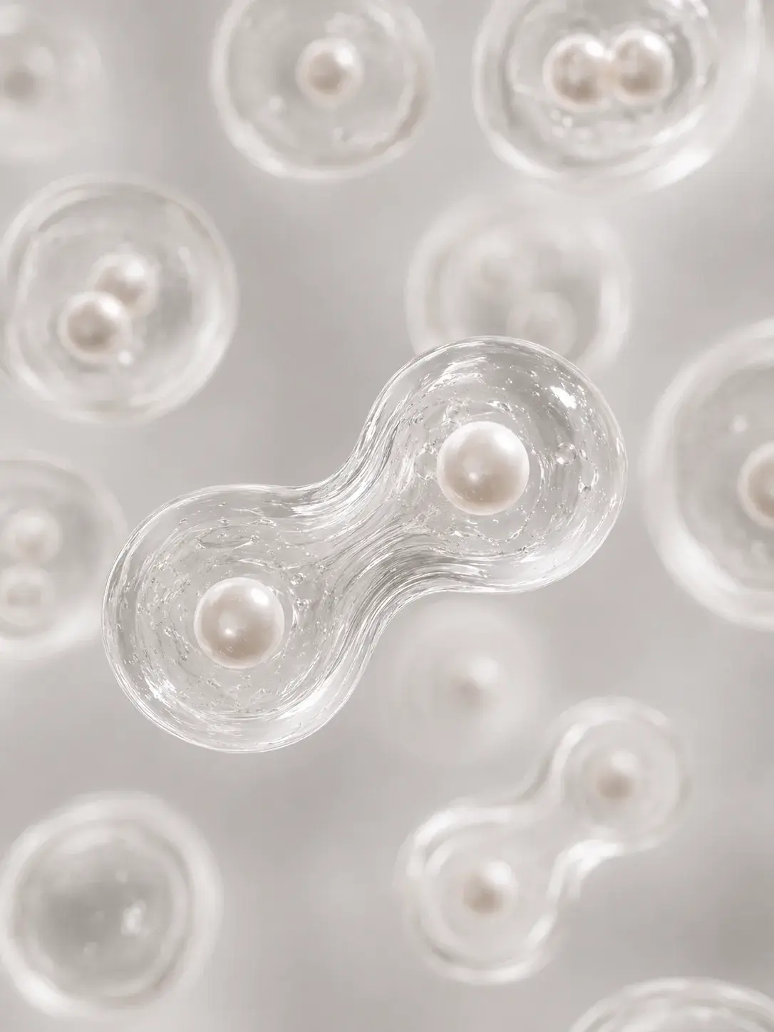 Cellules translucides biomorphiques renfermant des perles, art bio-conceptuel nacré en gros plan